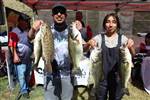 Gustavo Vasquez with his 14-year-old daughter Yareli Vasquez catching their big fish! 3.36 lbs. Way to Go Yareli!